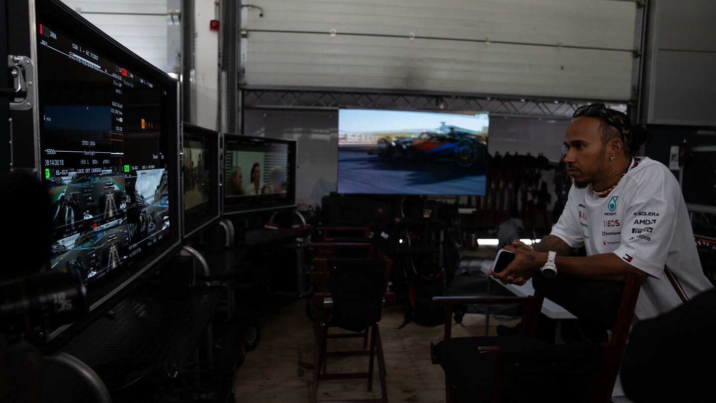 Producer Lewis Hamilton on the set of Apple Original Films’ “F1® The Movie,” a Warner Bros. Pictures release